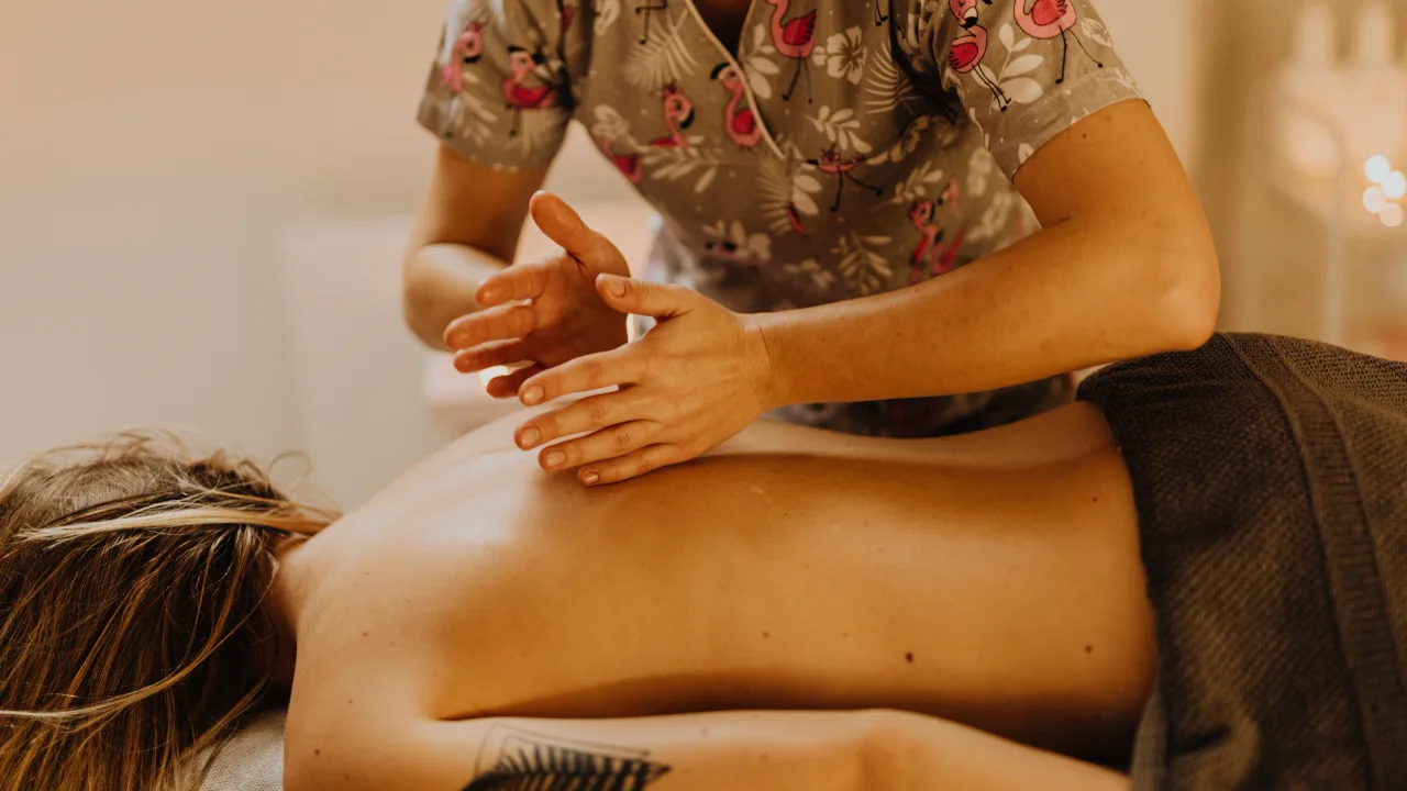 Therapist giving a relaxing back massage