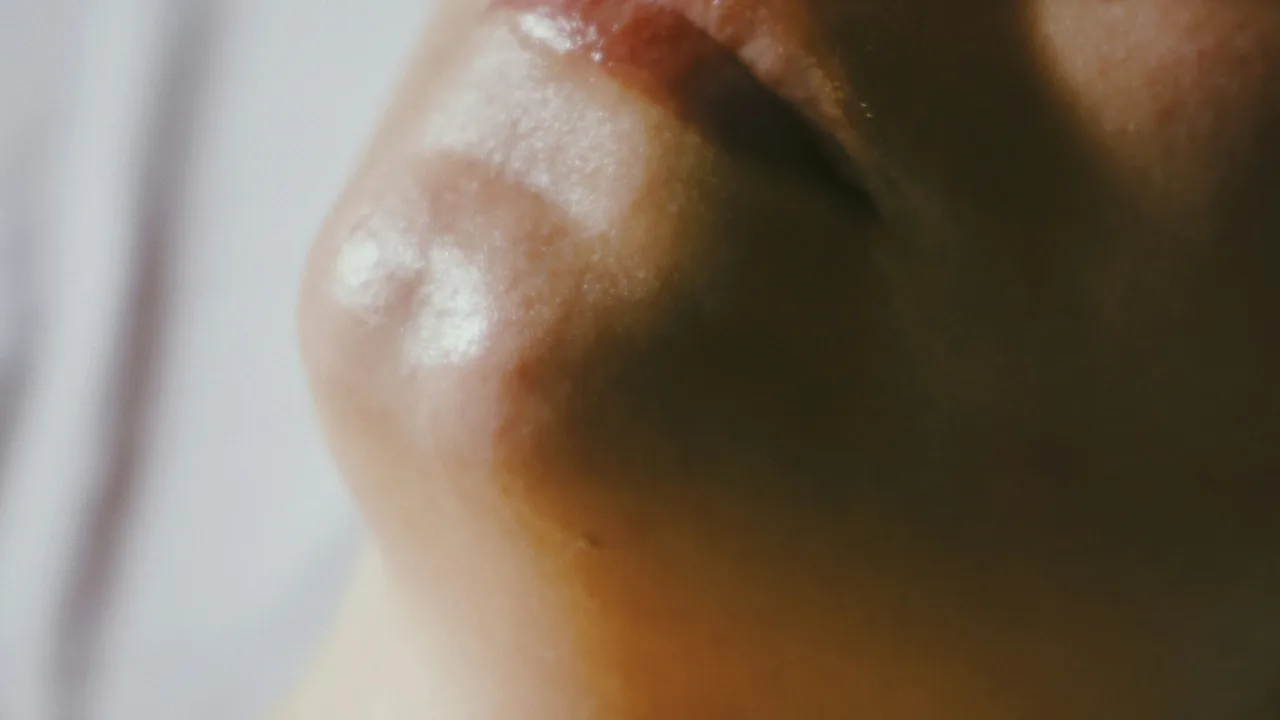 Close-up of smooth, glowing skin and lips