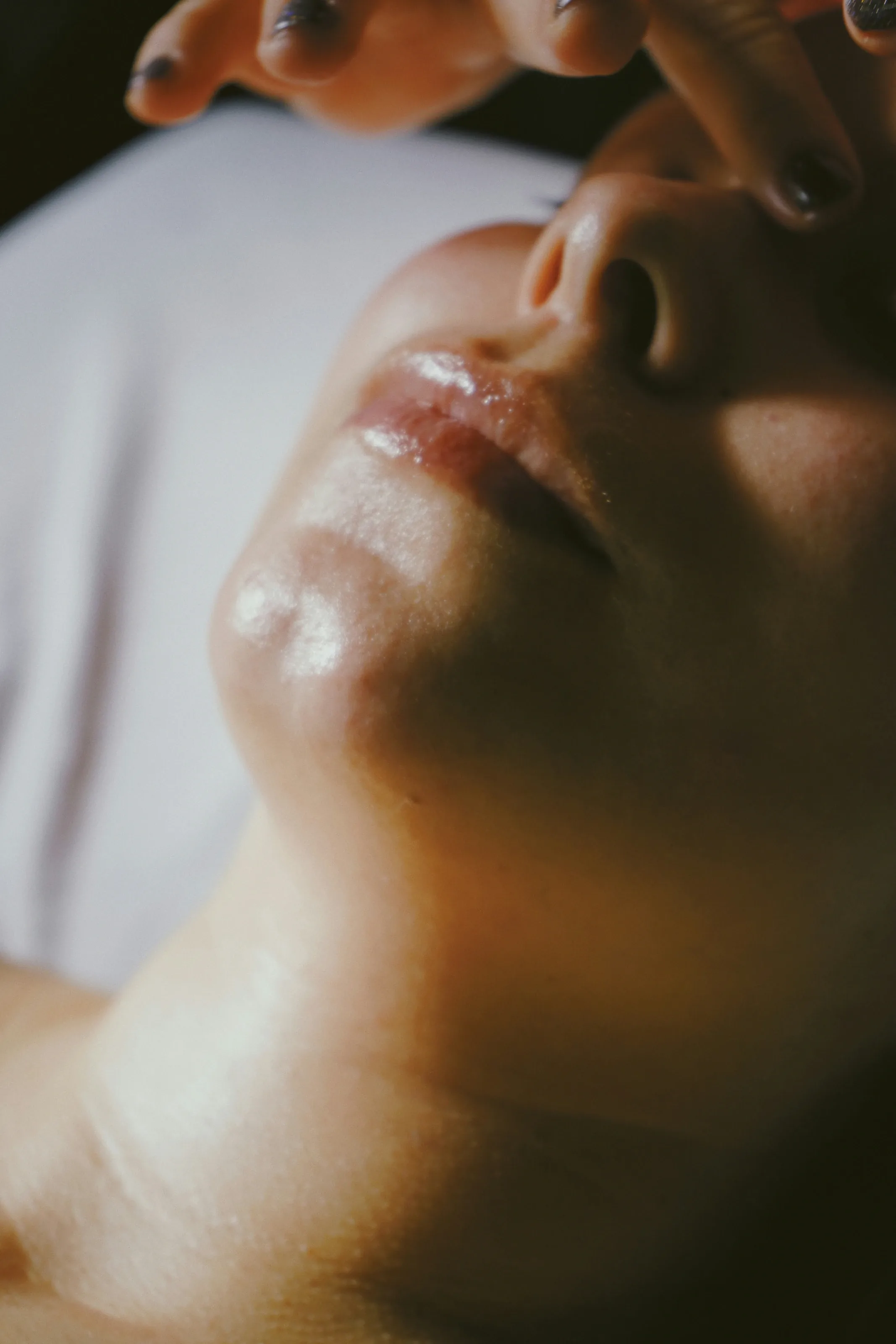 Close-up of smooth, glowing skin and lips