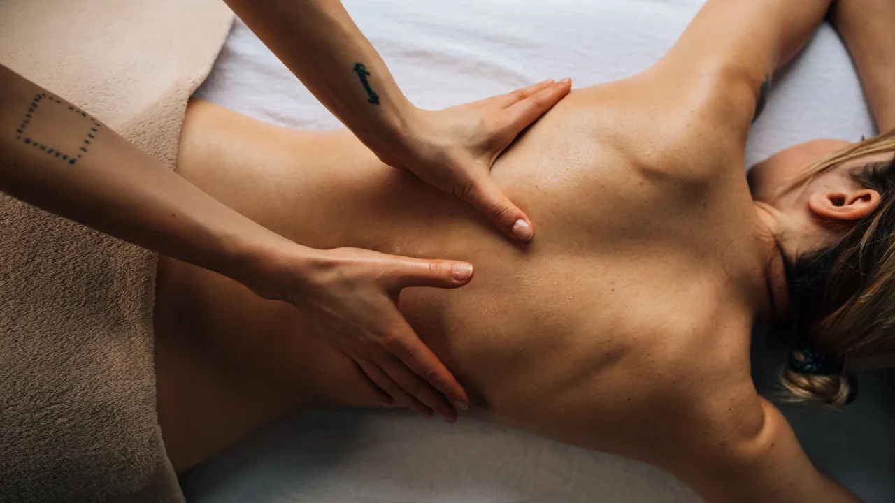 Client lying face down enjoying a back massage